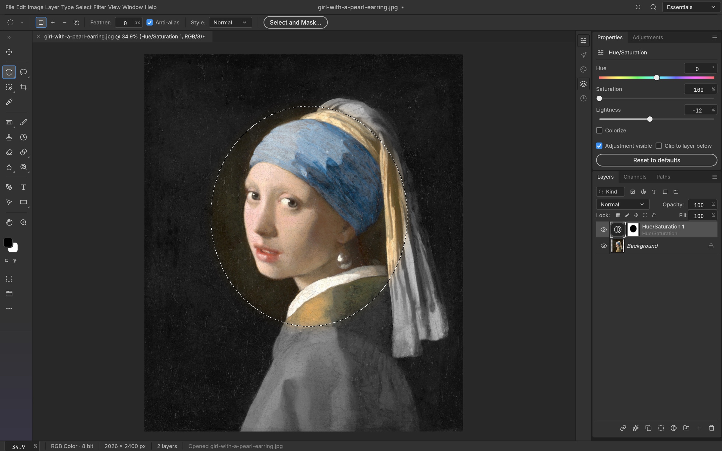 A selection and adjustment-layer mask applied to Vermeer’s Girl with a Pearl Earring.